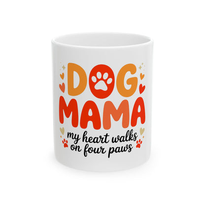 White mug with "DOG MAMA my heart walks on four paws" text and paw print.