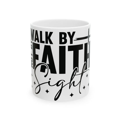 White mug with black text reading "We walk by faith, not by sight".