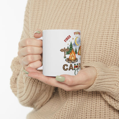 White mug with camping theme design, featuring fire, tent, and text.