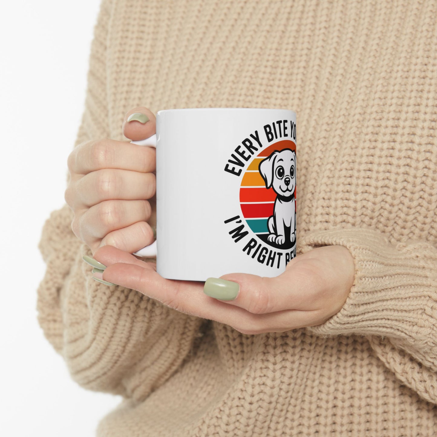 White mug with dog illustration and text "EVERY BITE YOU I'M RIGHT PLE".