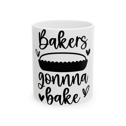 White mug with "Bakers gonna bake" and a pie graphic.