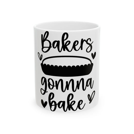 White mug with "Bakers gonna bake" and a pie graphic.