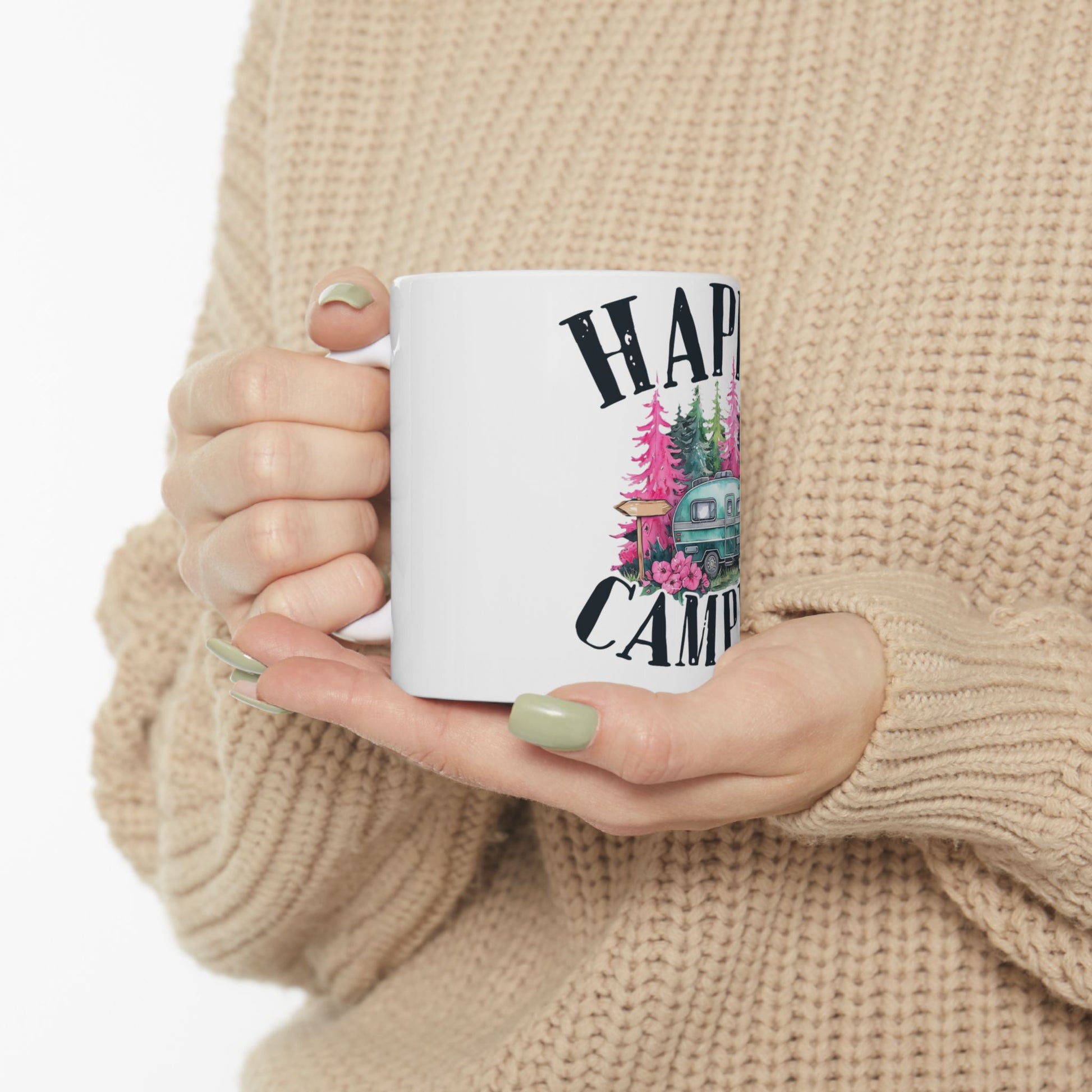 White mug with "Happy Camper" text and a colorful camper illustration.