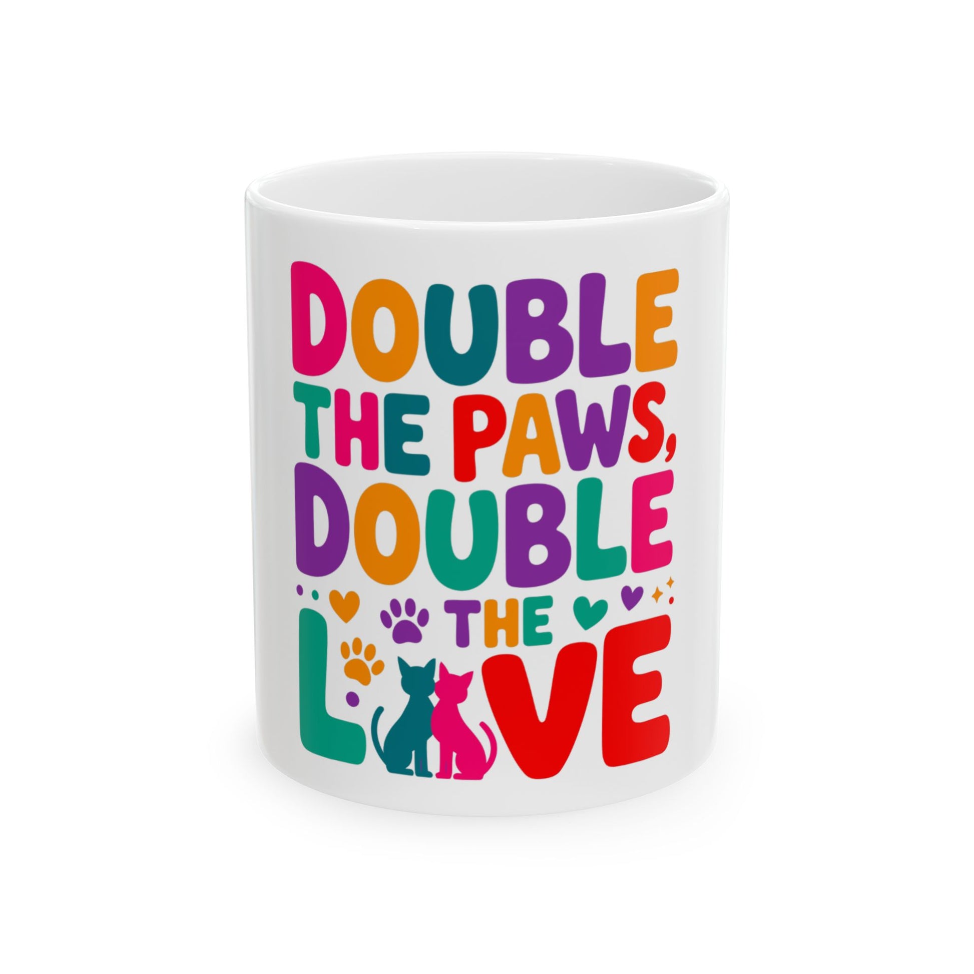 Mug with colorful text "Double the Paws, Double the Love" and cat silhouettes.