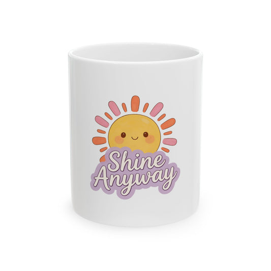 White mug with a smiling sun and "Shine Anyway" text.