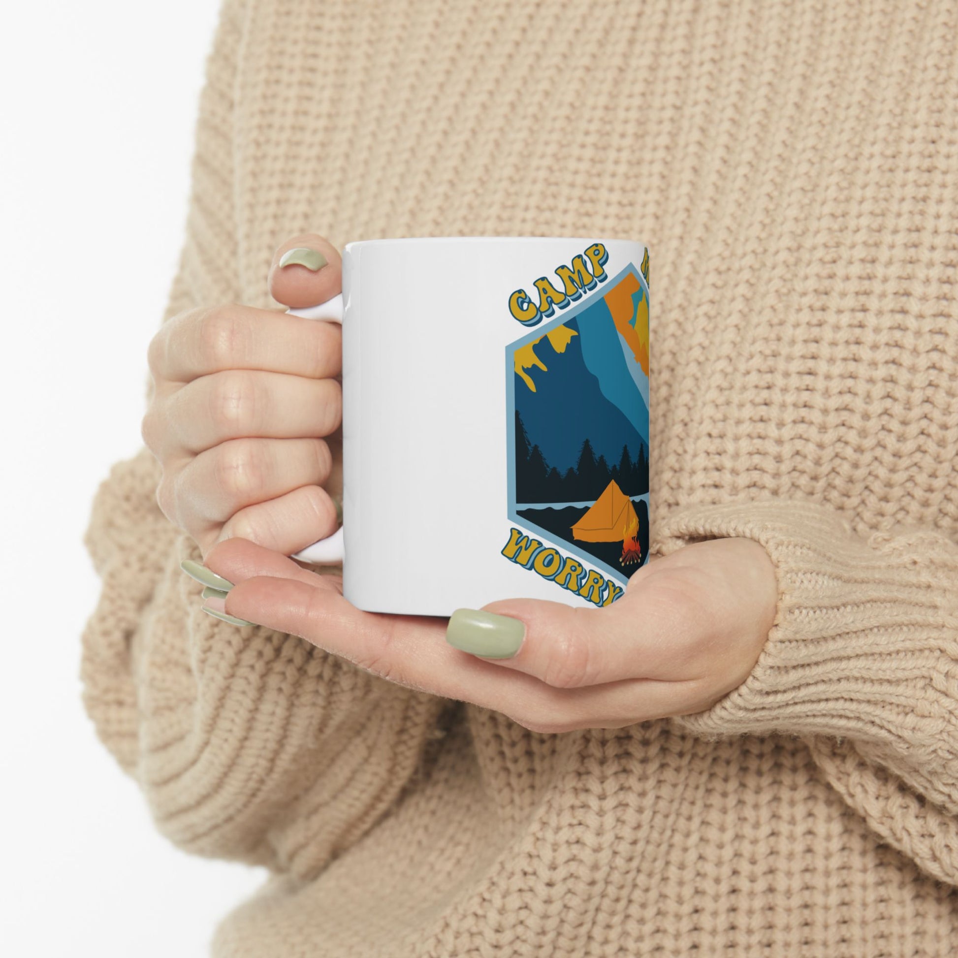 White mug with "Camp Worry" text and a mountain campfire scene.