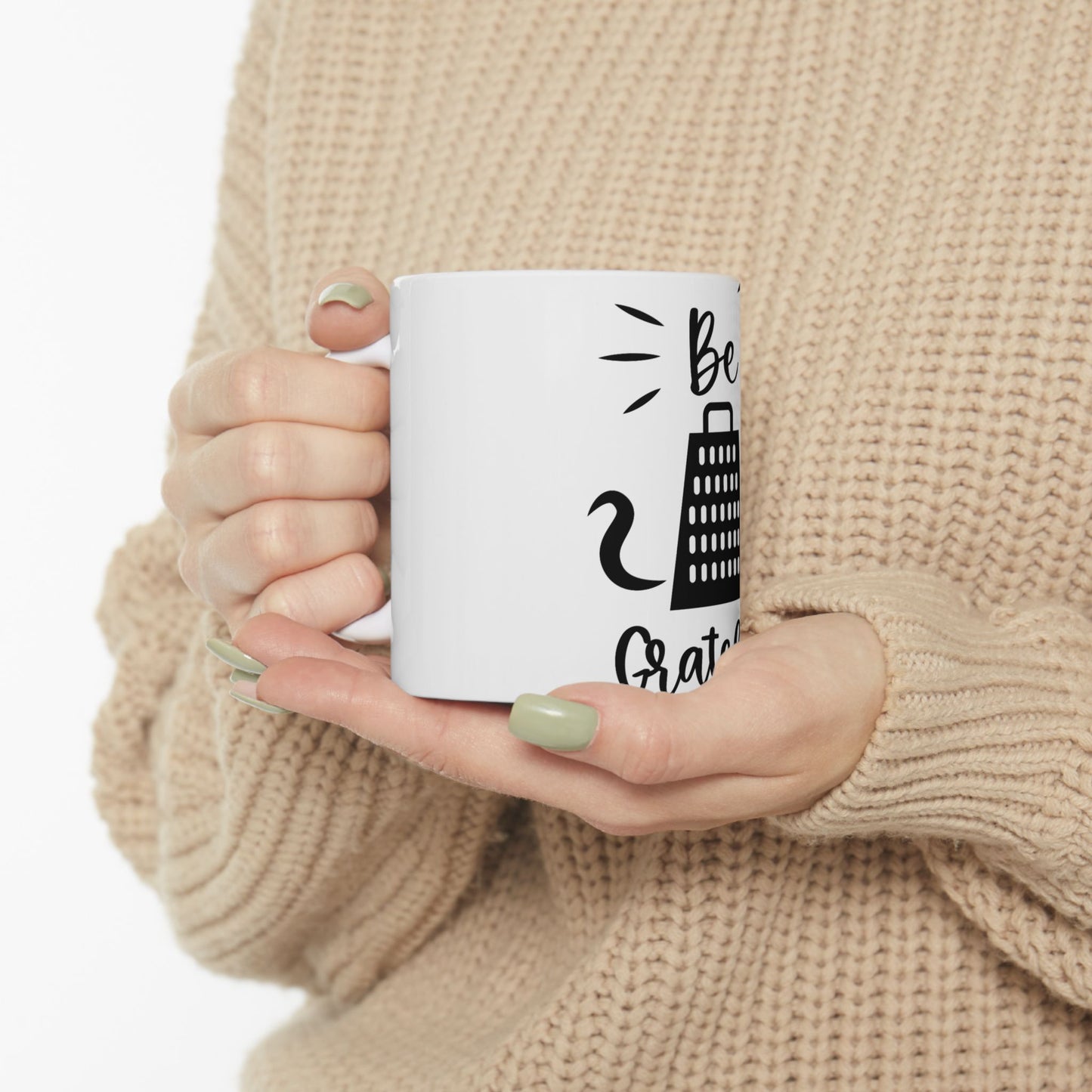 White mug with "Be Grateful" and a grater graphic.