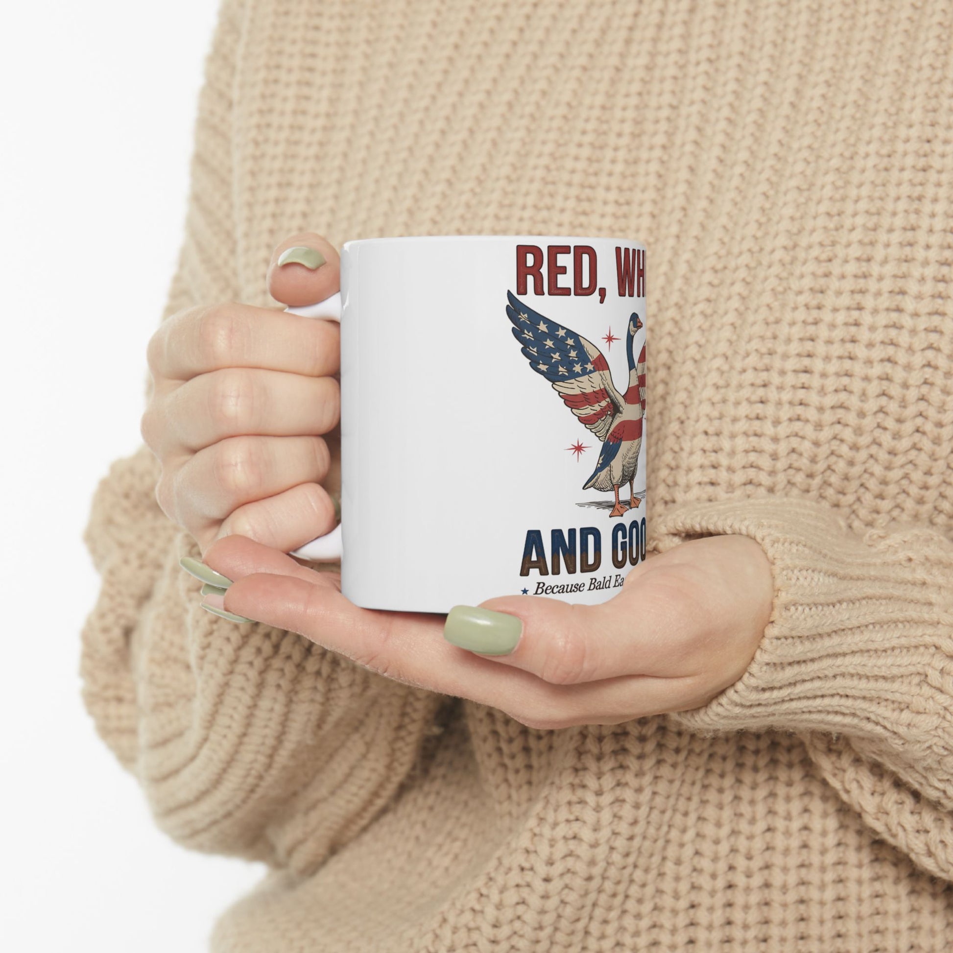White mug with "Red, White, and Gooose" and American flag eagle graphic.