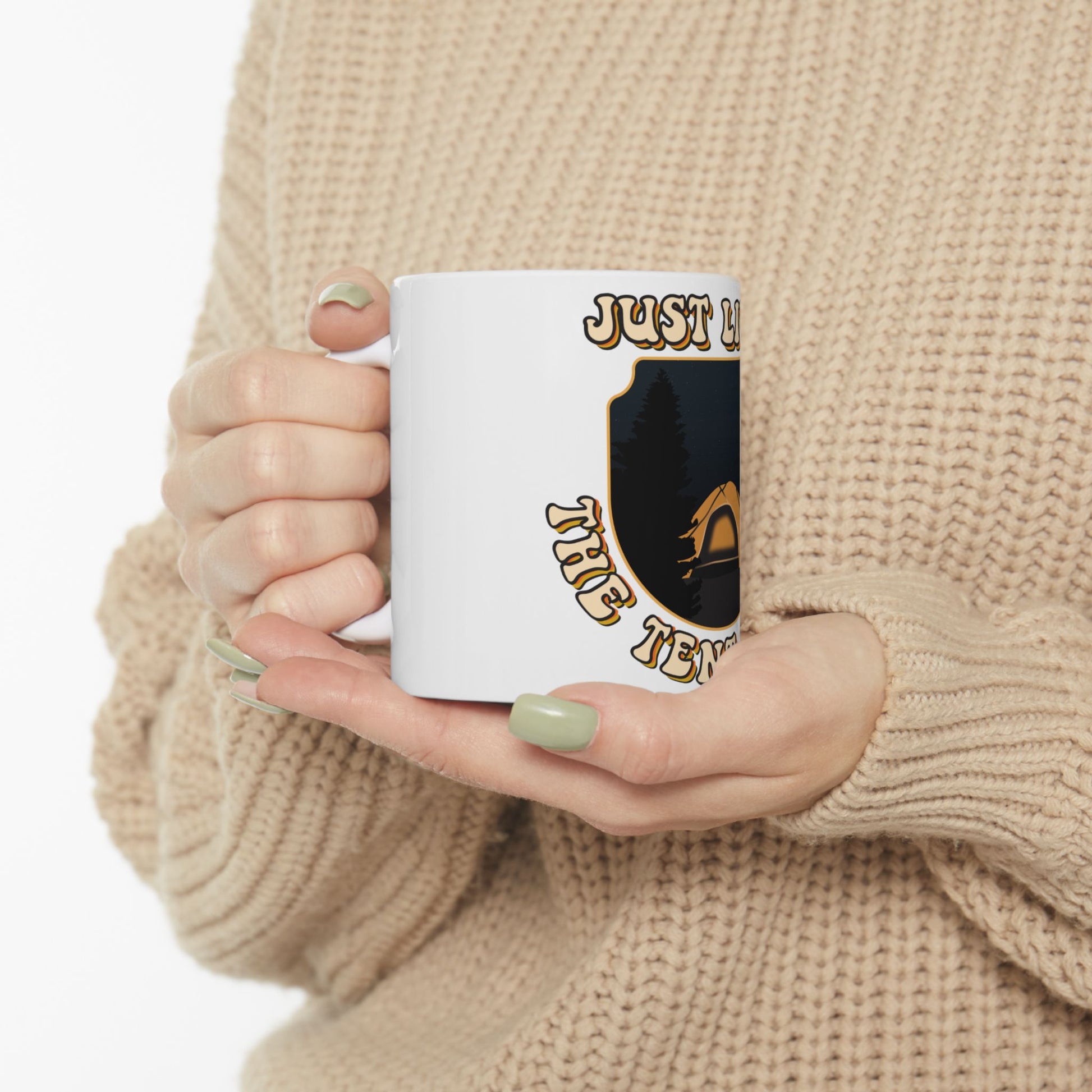 Mug with "Just Love to Tent" and camping scene graphic.