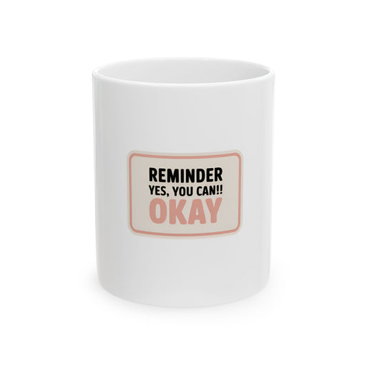 White mug with "REMINDER YES, YOU CAN!! OKAY" text.