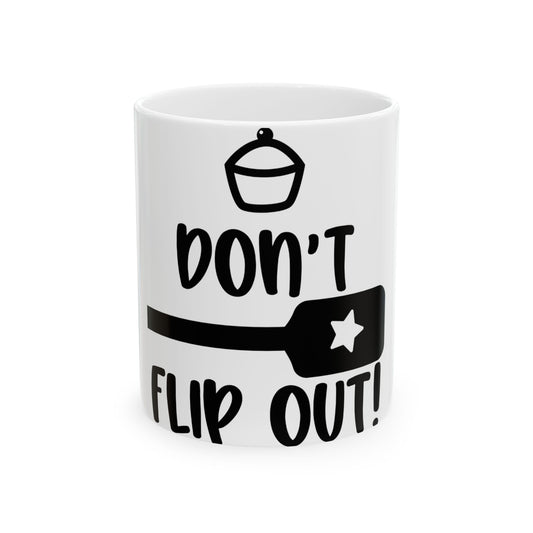 White mug with "don't flip out!" and cupcake graphic.
