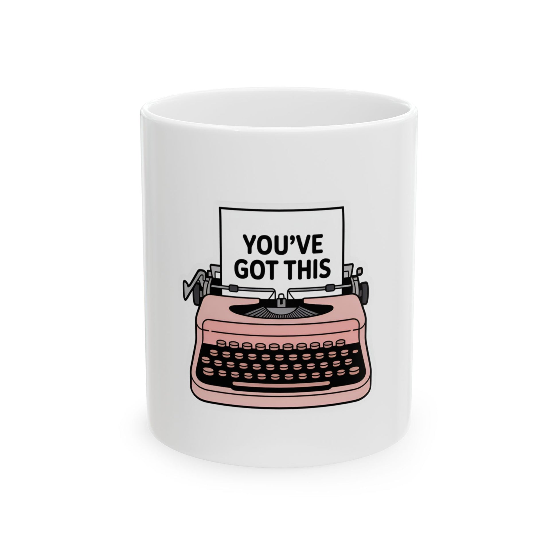 Pink typewriter graphic with "YOU'VE GOT THIS" text on white mug.