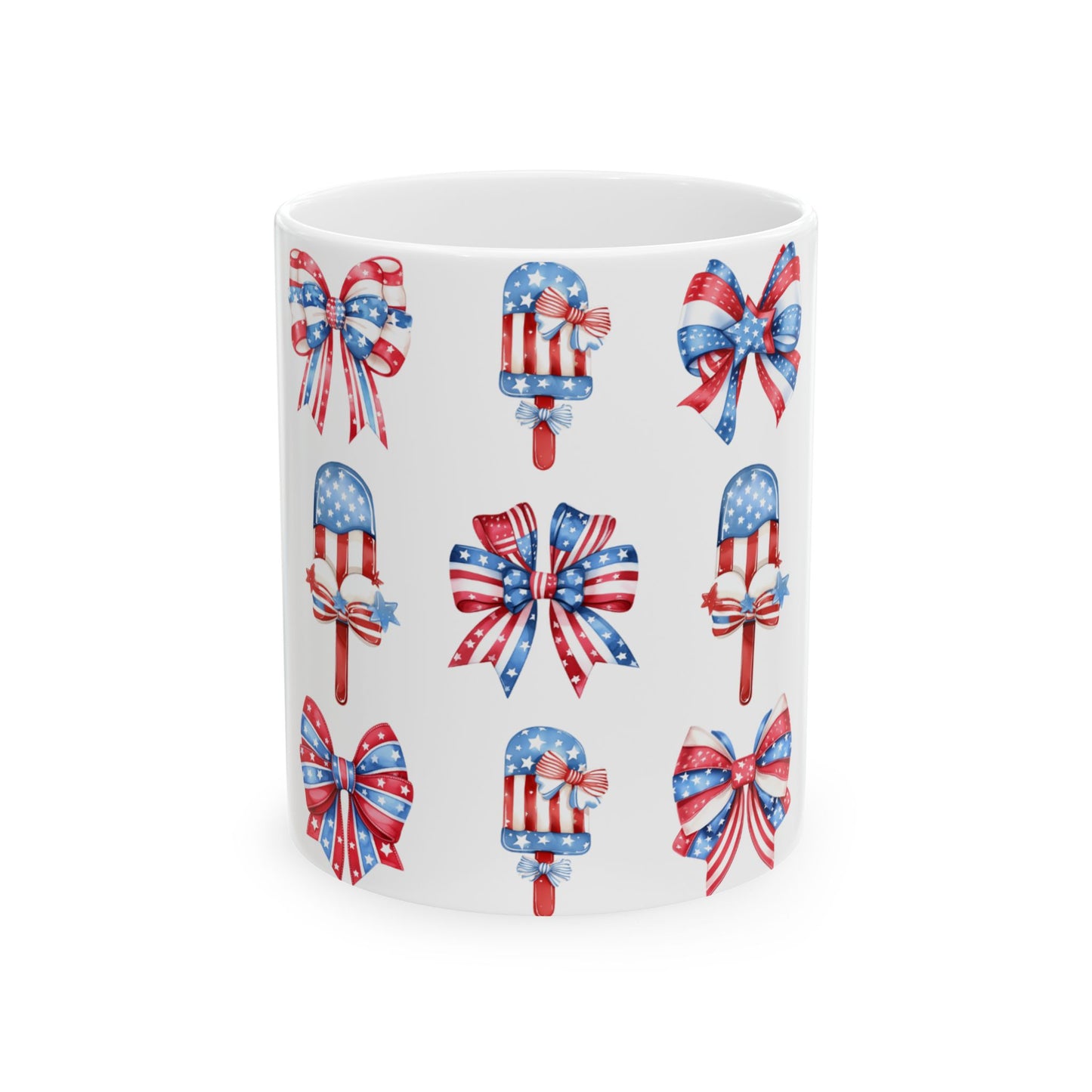 Patriotic bows and popsicle graphics on a white mug.