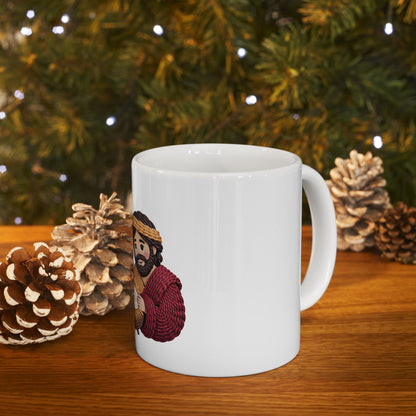 White mug with illustration of a man in a red robe and brown sandals.