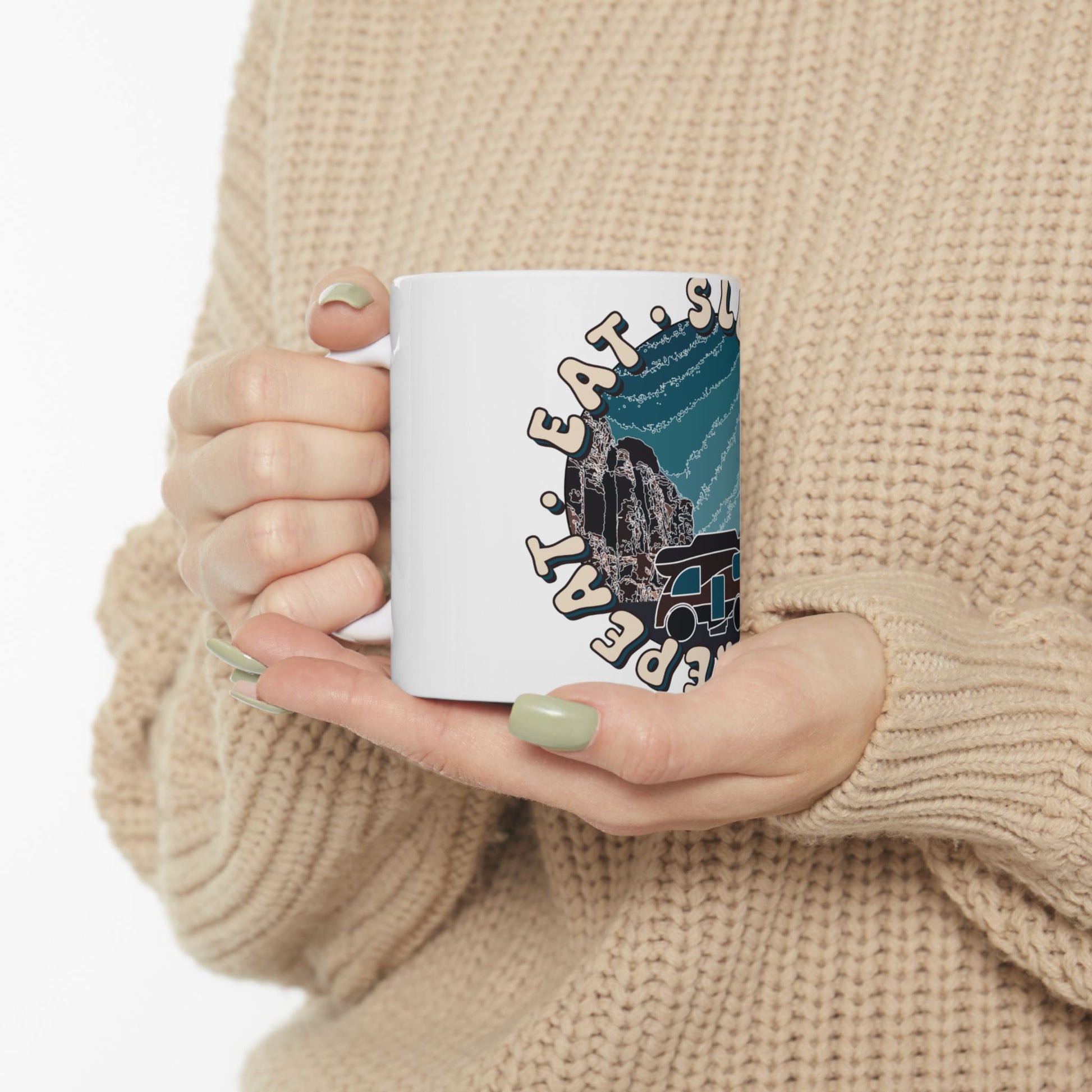 White mug with circular text and a castle graphic.