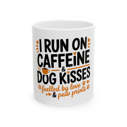 White mug with text: I RUN ON CAFFEINE & DOG KISSES, fuelled by love & paw prints.