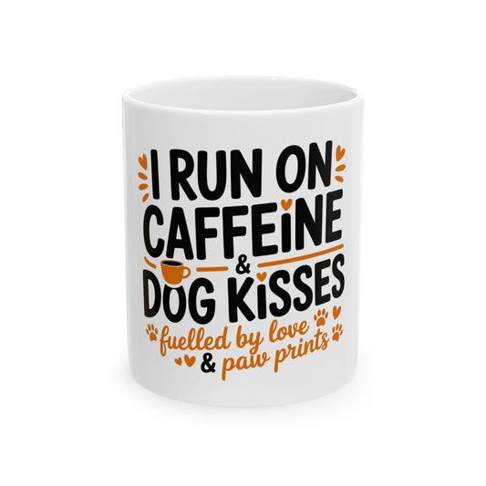 White mug with text: I RUN ON CAFFEINE & DOG KISSES, fuelled by love & paw prints.