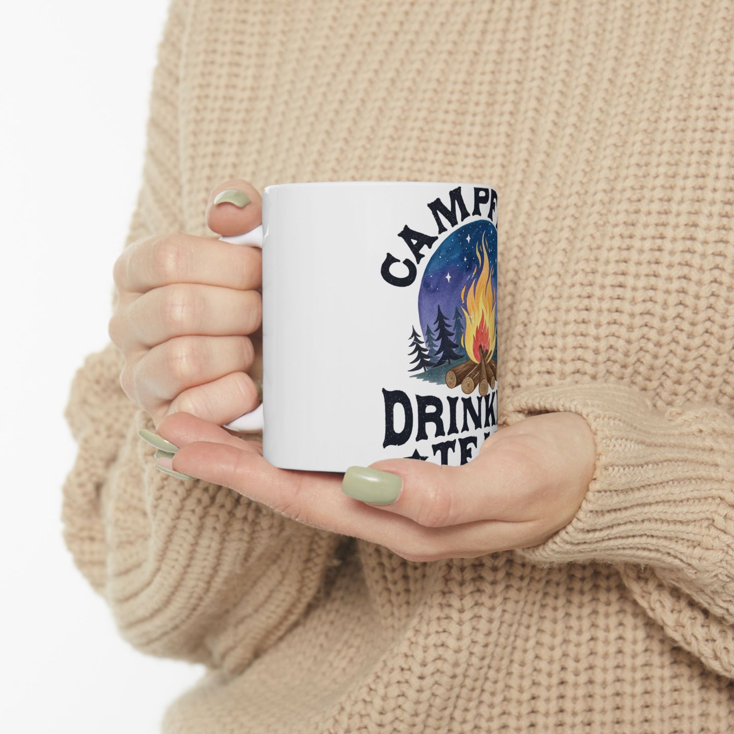 White mug with "CAMP DRINK TEA" and campfire graphic.