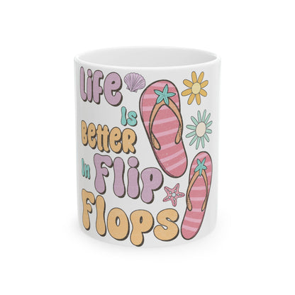 Mug with text "Life is better in flip flops" and beach motifs.