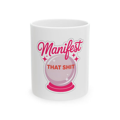 Mug with pink crystal ball and "Manifest That Shit" text.