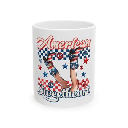 White mug with "American Sweetheart" and patriotic cowboy boots design.