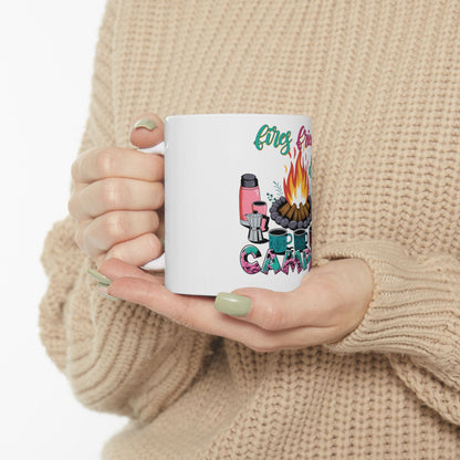 White mug with camping graphic and "first friend camping" text.