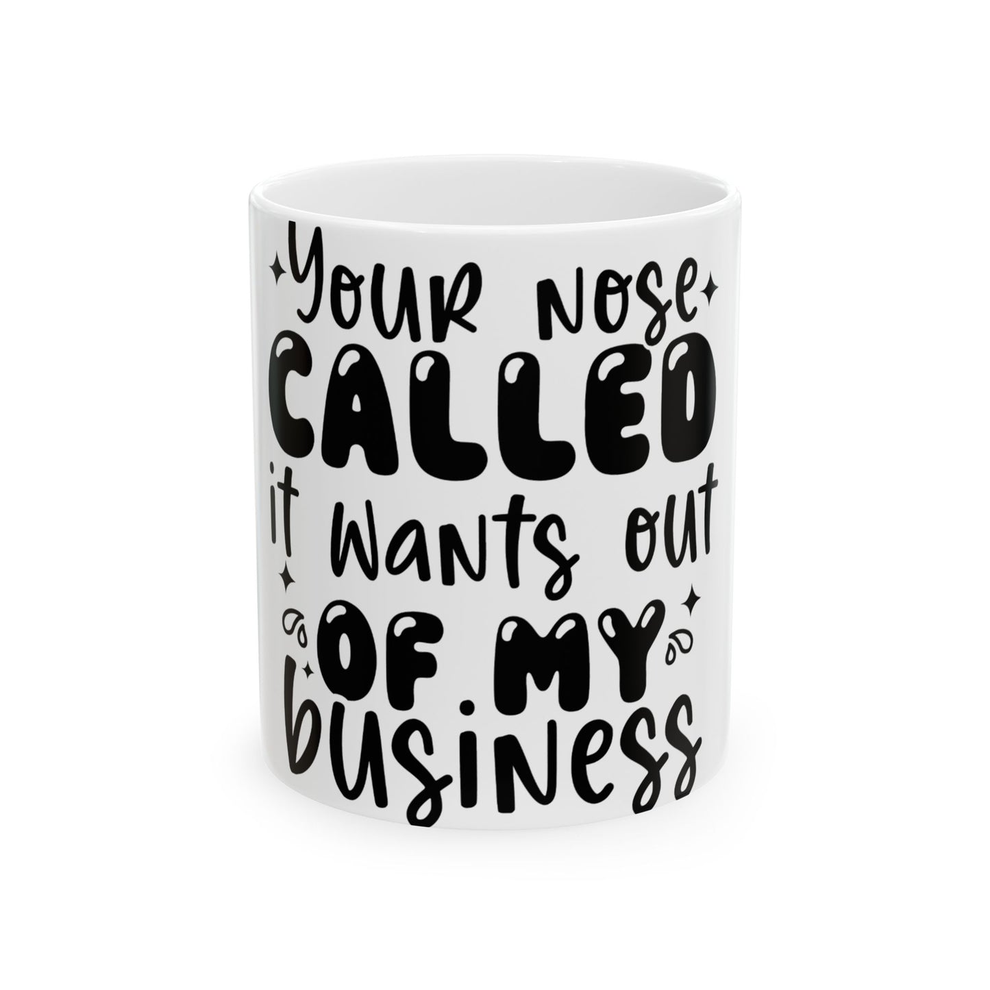 White mug with black text "Your nose called. It wants out of my business."