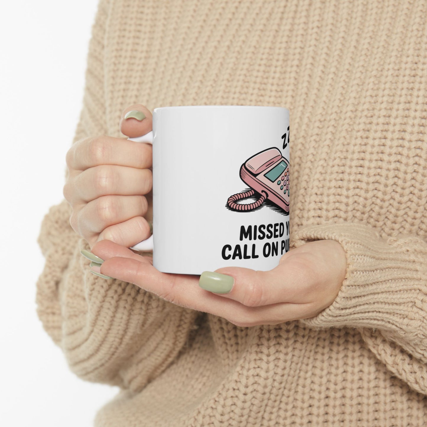 White mug with retro pink phone illustration and text "MISSED Y CALL ON PU".