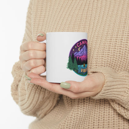 White mug with "Camping Vibes" and mountain landscape graphic.