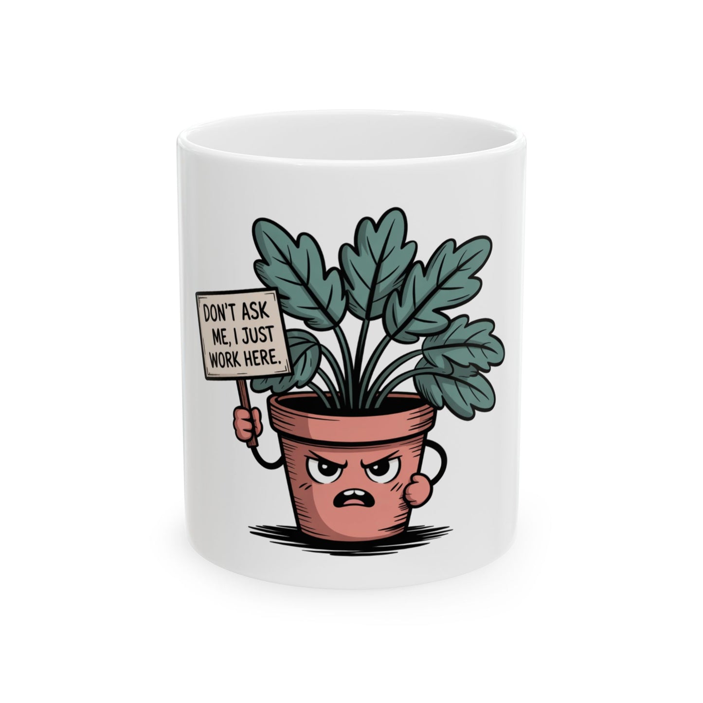 Mug with a grumpy potted plant holding a sign that says "DON'T ASK ME, I JUST WORK HERE."