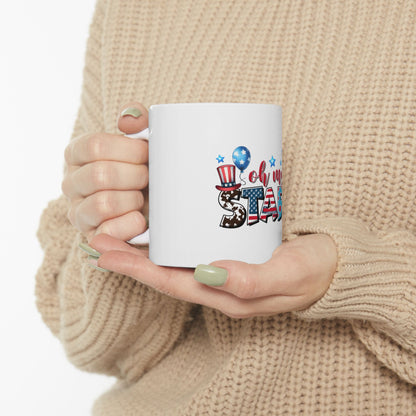 White mug with "Oh, my stars" text and patriotic graphics.