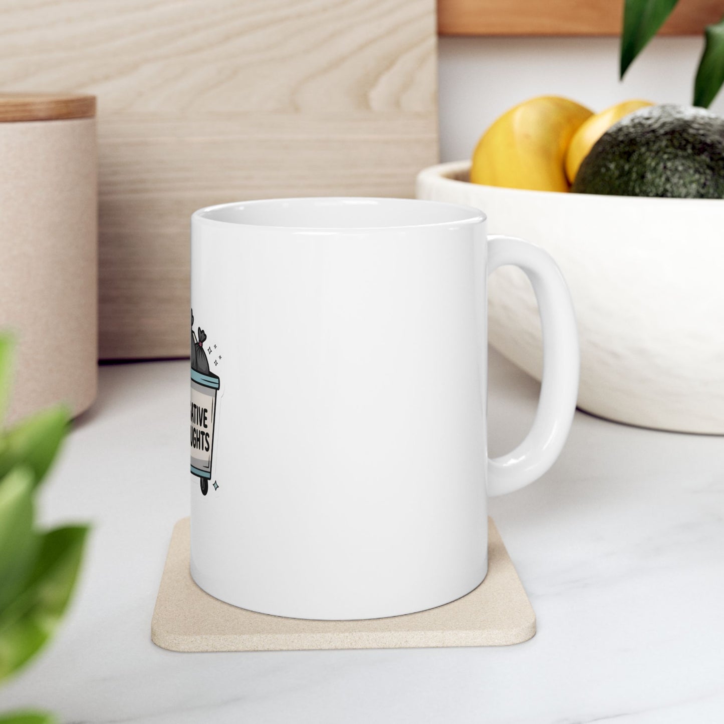 White mug with "CREATIVE THOUGHTS" text on a coaster.