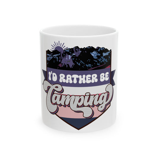 White mug with "I'd Rather Be Camping" text and mountain sunset graphic.