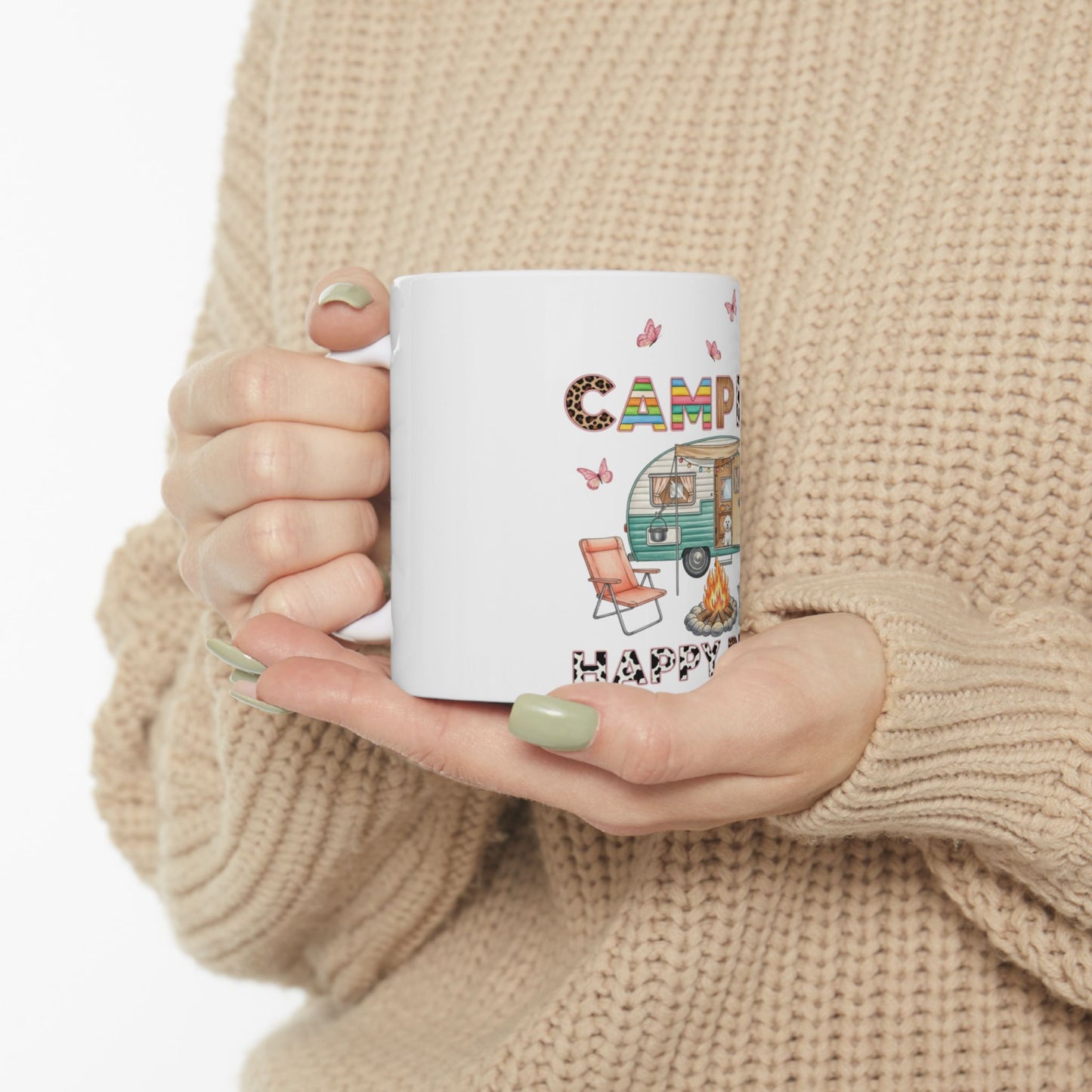 Mug with colorful camper, campfire, and "CAMPING HAPPY" text.