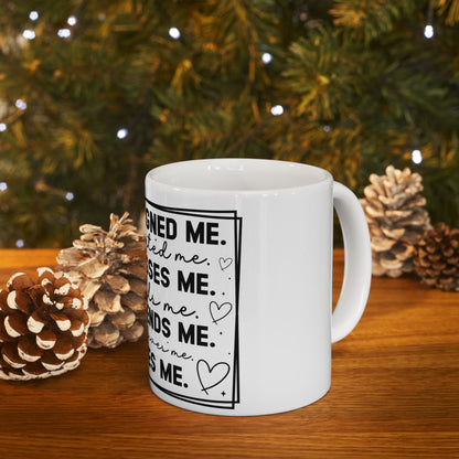White mug with handwritten text about love and friendship.