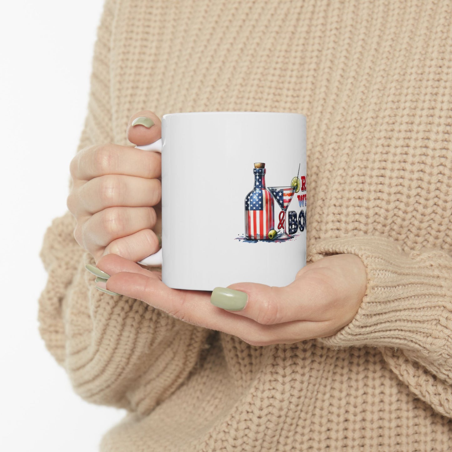 White mug with American flag martini glass and bottle graphic.