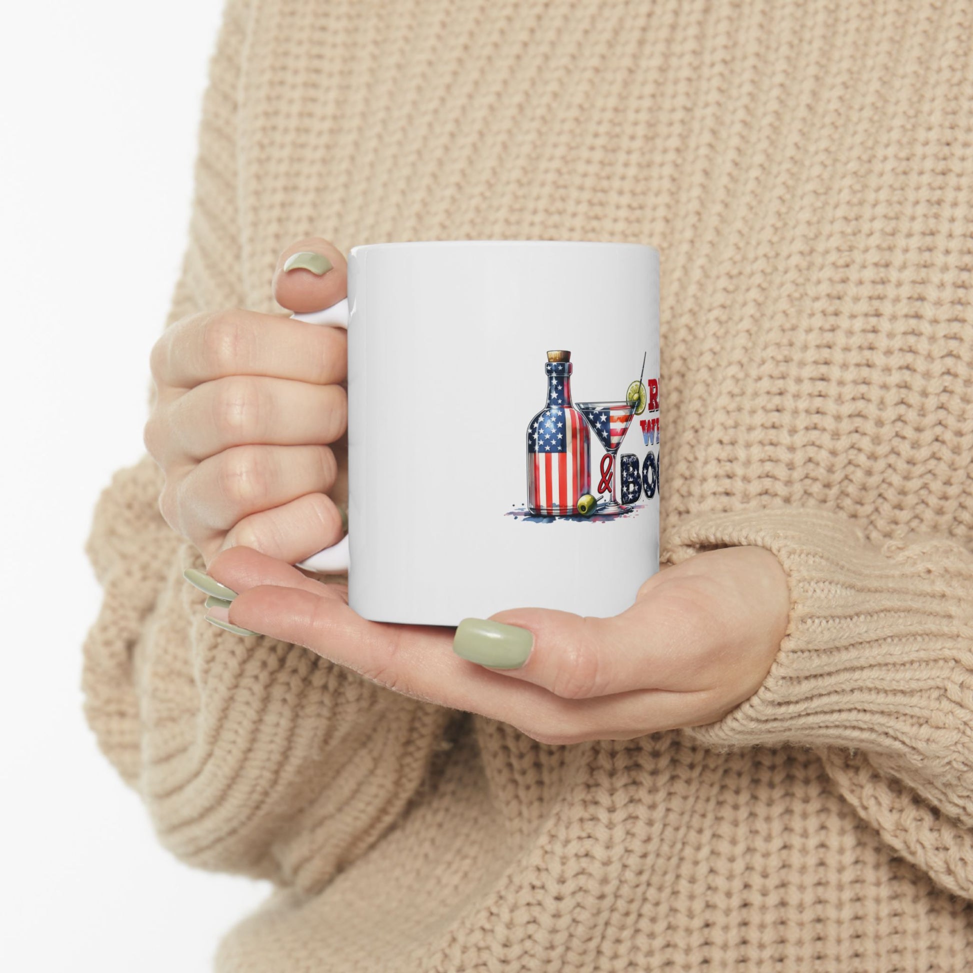 White mug with American flag martini glass and bottle graphic.