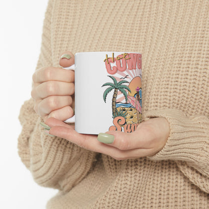 White mug with "Hot Girl Summer" text and tropical beach scene.