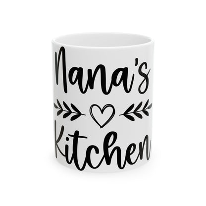 White mug with "Nana's Kitchen" and a heart in black lettering.
