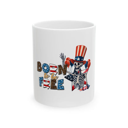 Skeleton wearing patriotic hat and holding balloons on a white mug.