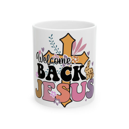 Mug with "Welcome Back Jesus" text and floral cross design.