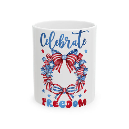 White mug with "Celebrate Freedom" and a patriotic wreath.