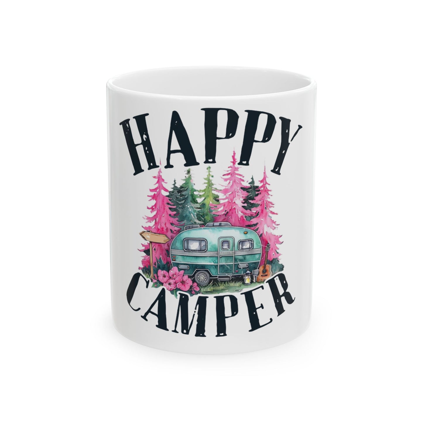 Mug with "Happy Camper" text and a vintage camper surrounded by trees.