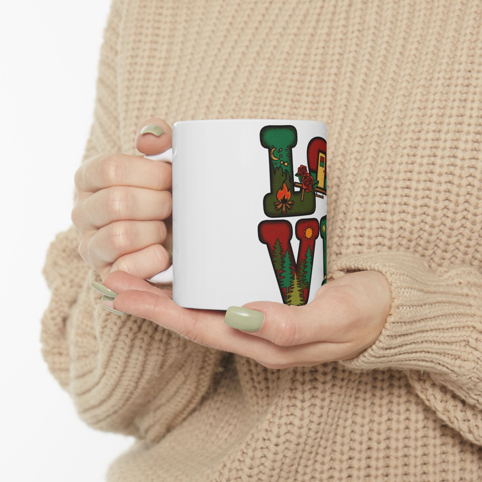 White mug with "LOVE" text featuring woodland illustrations.