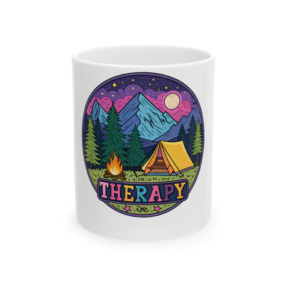 Mug featuring a camping scene with tent, campfire, and mountains under a starry sky.