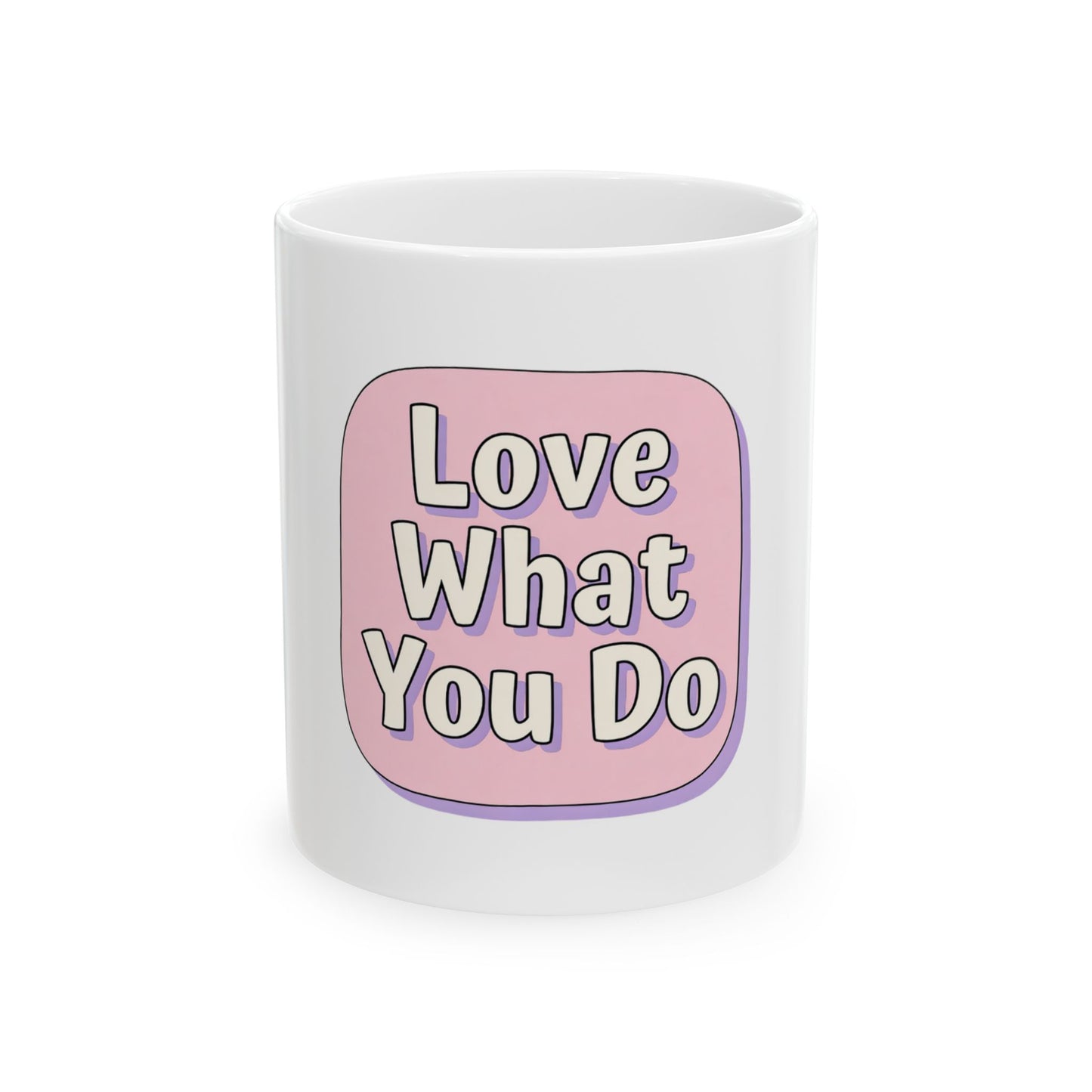 White mug with pink speech bubble saying "Love What You Do".
