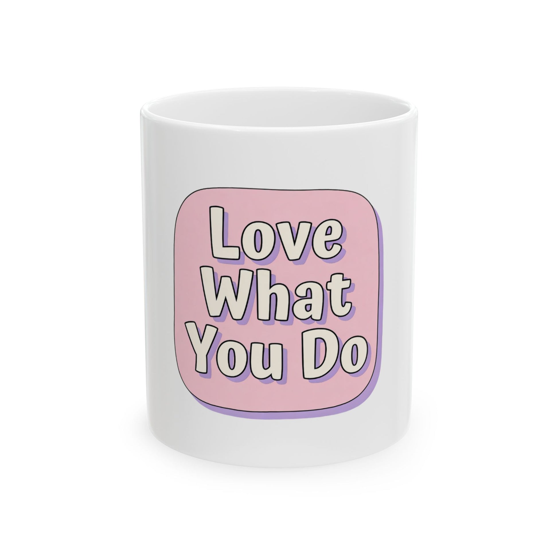White mug with pink speech bubble saying "Love What You Do".