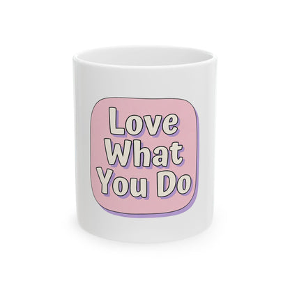 White mug with pink speech bubble saying "Love What You Do".