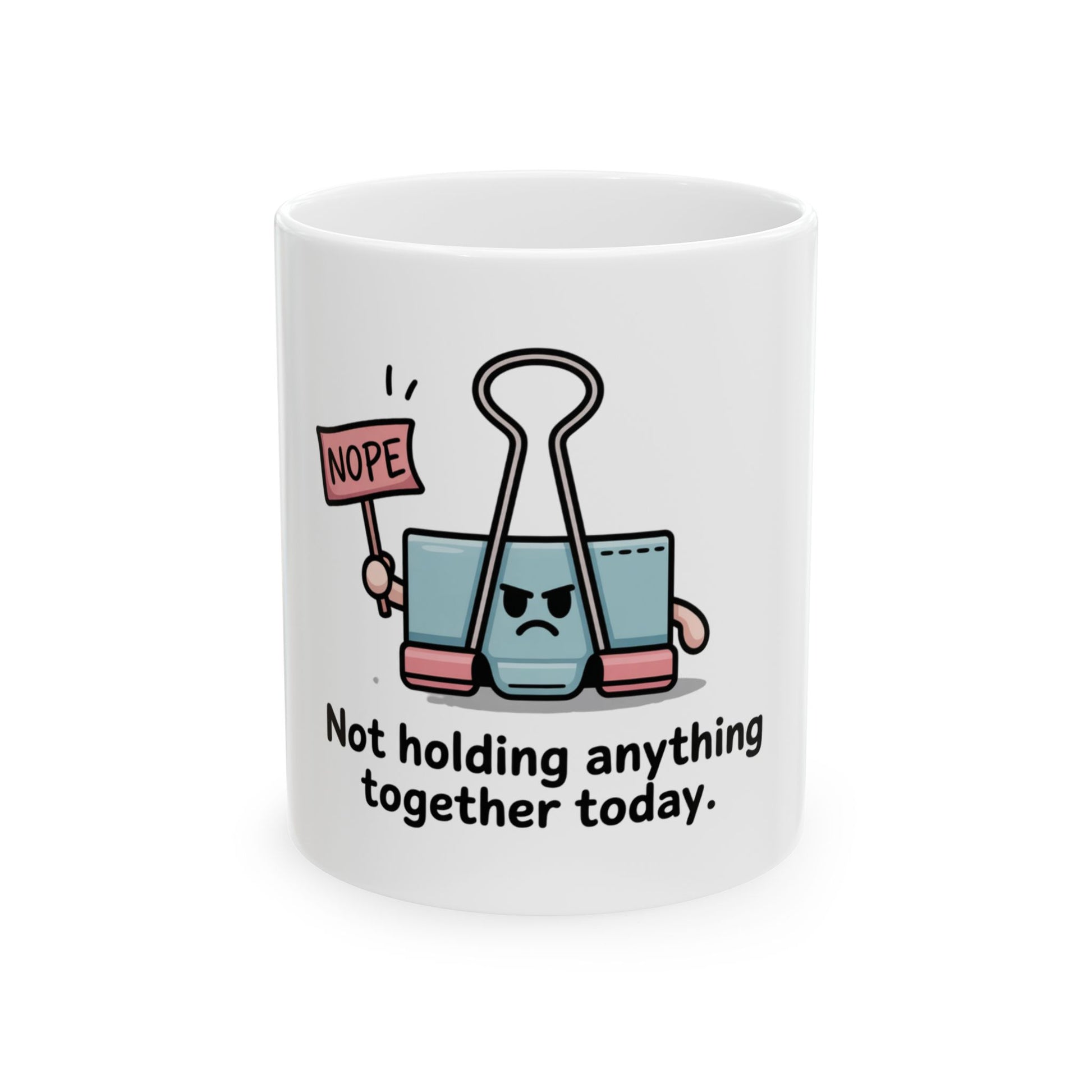 Binder clip character with "NOPE" sign on a mug that says "Not holding anything together today."