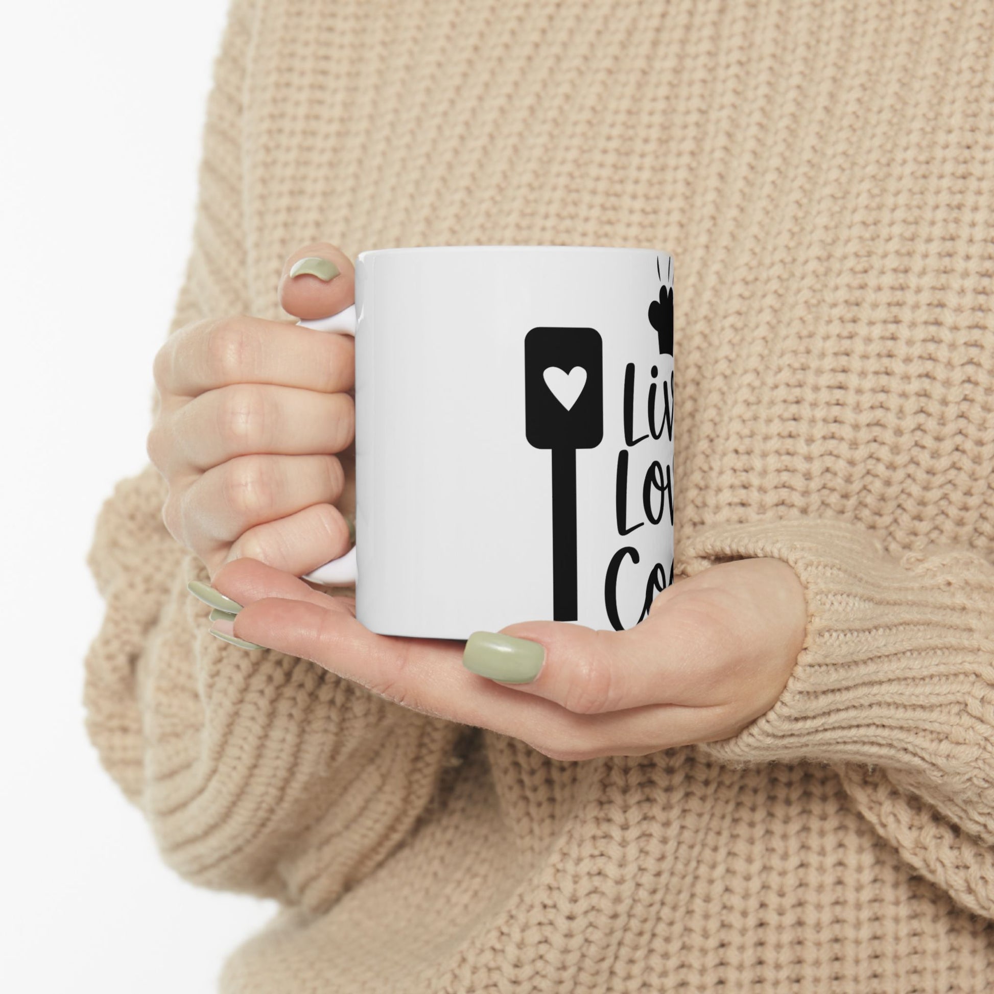 White mug with "Live Love Coffee" text and a coffee bean icon.